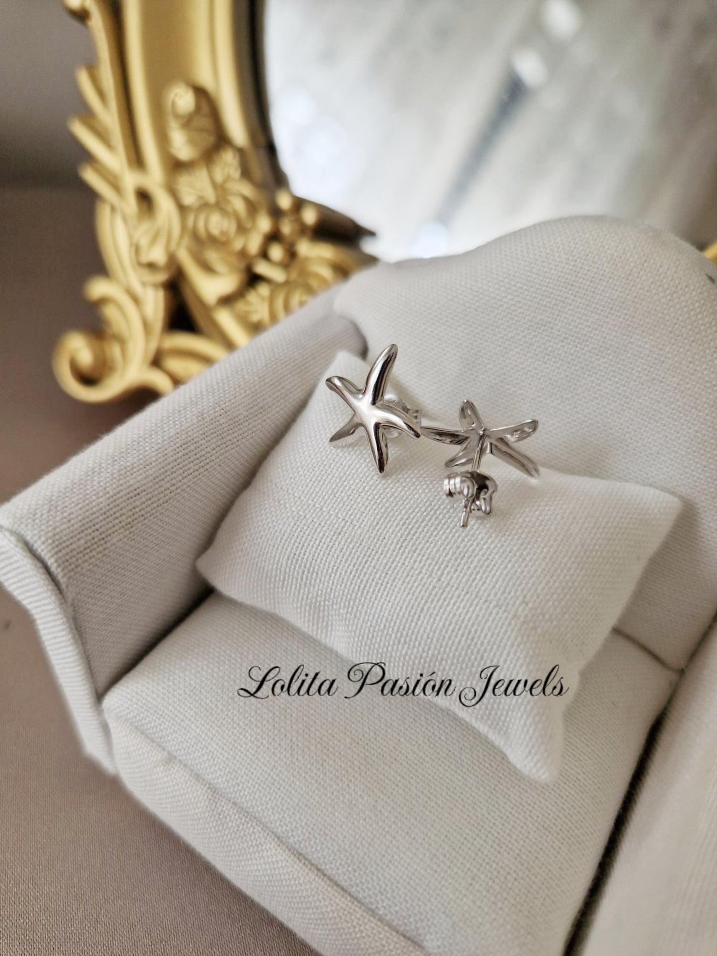 Pendientes estrella de mar plateados