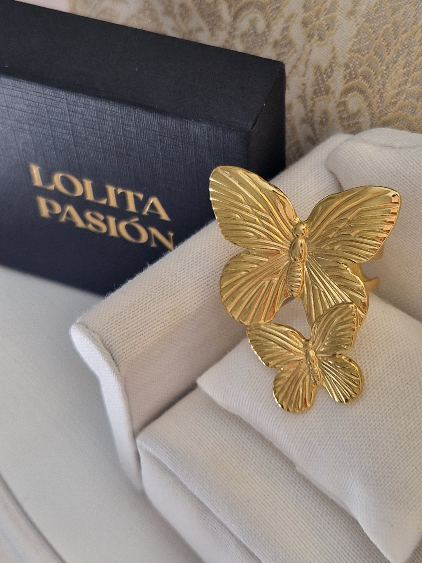 Anillo mariposas acero dorado ajustable