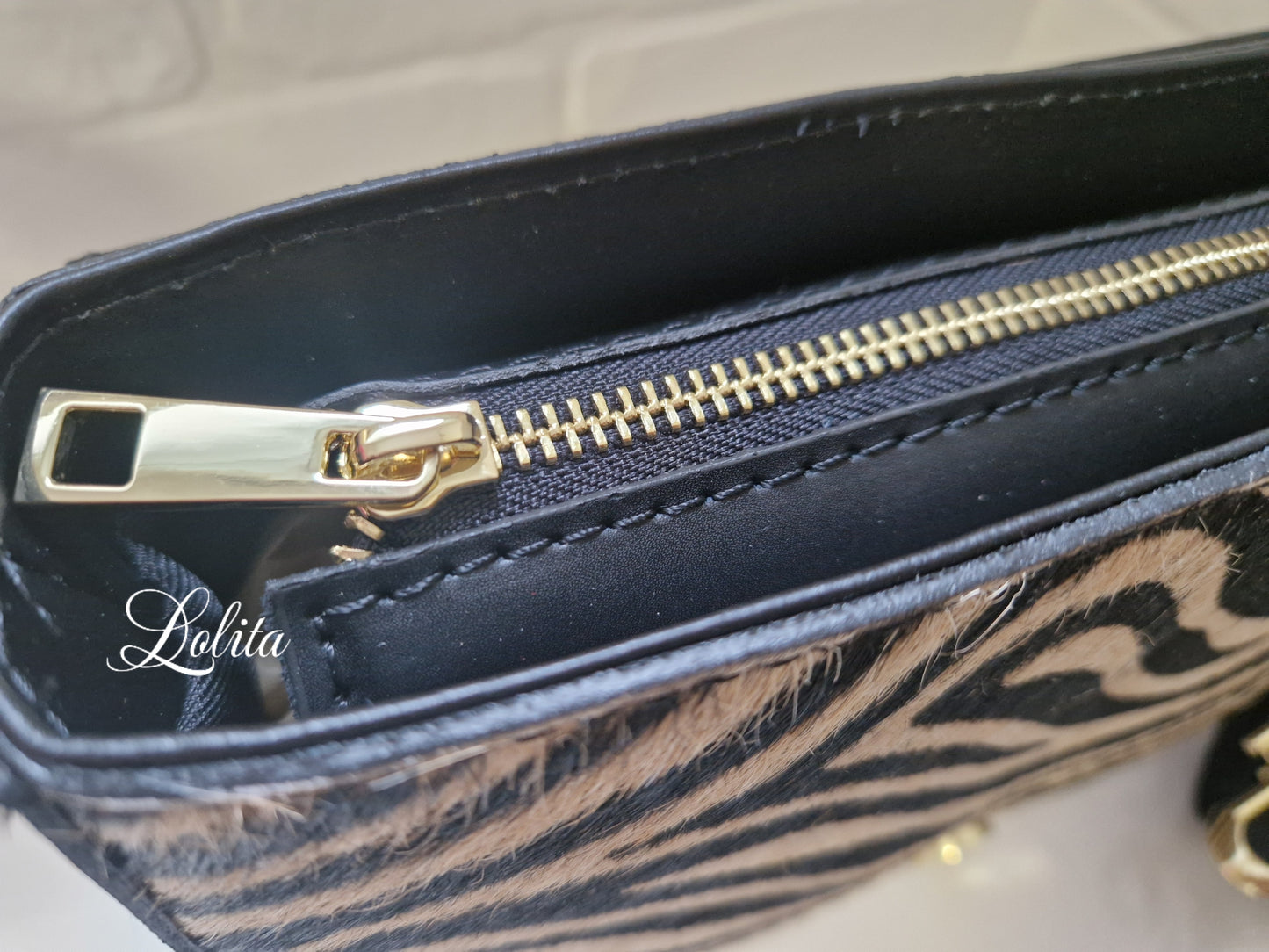 BOLSO SAFARI