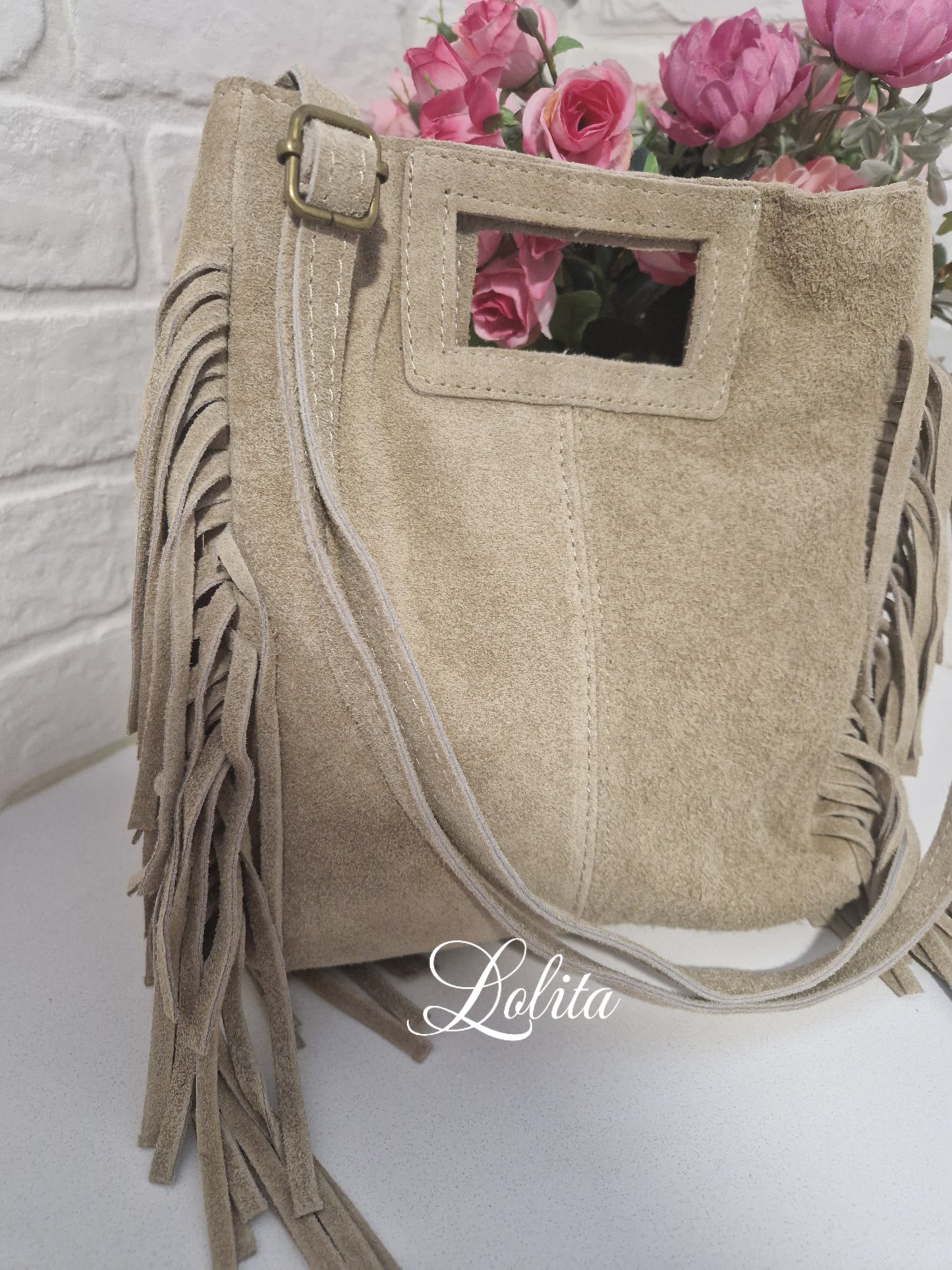 Bolso 100% piel beige con flecos