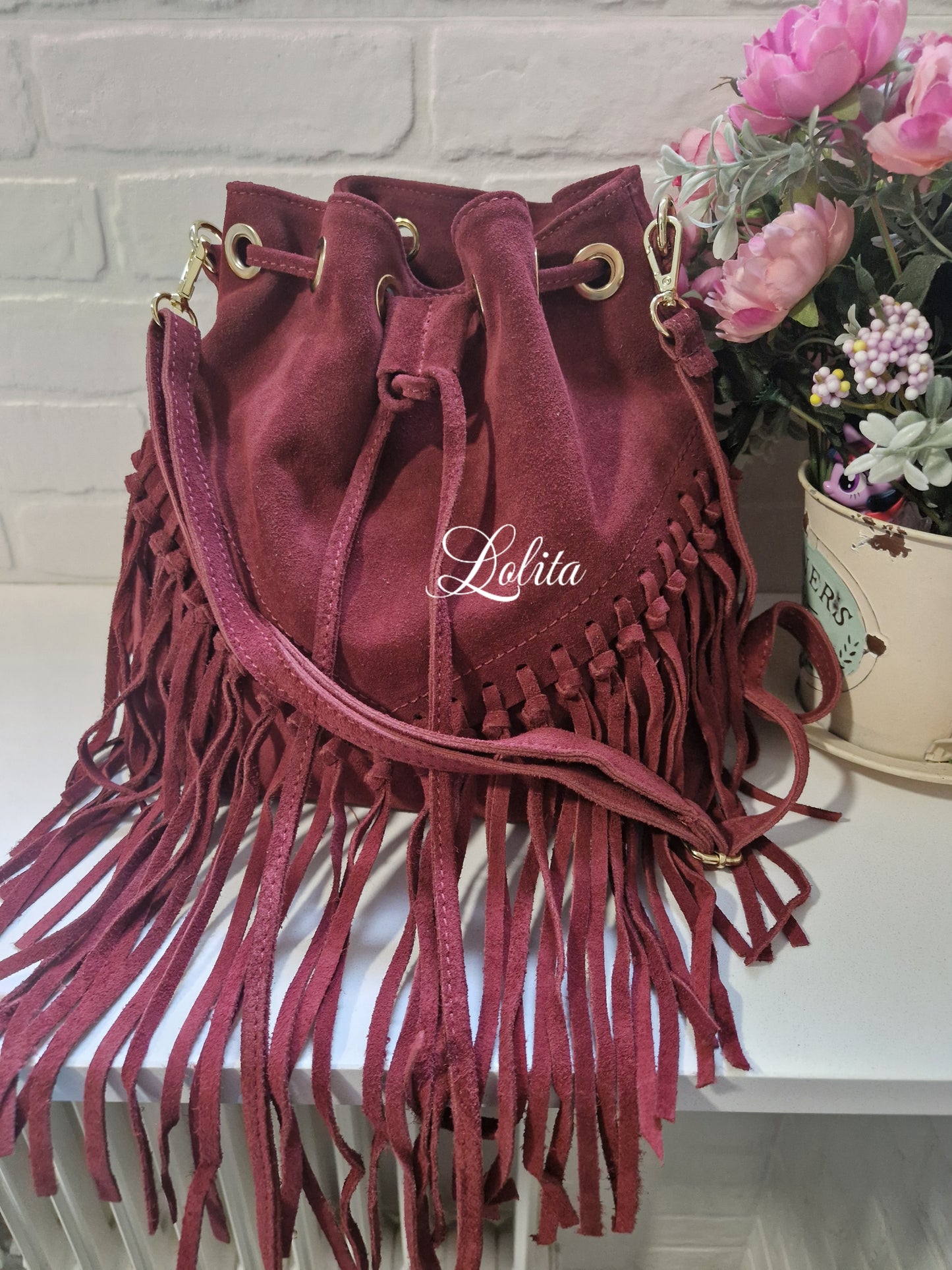 Bolso 100% piel burdeos con flecos